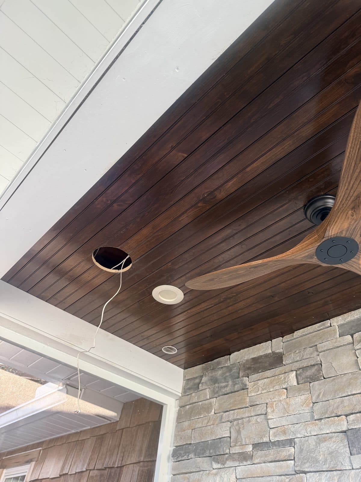 Camera and speaker cabling roughed into a porch ceiling